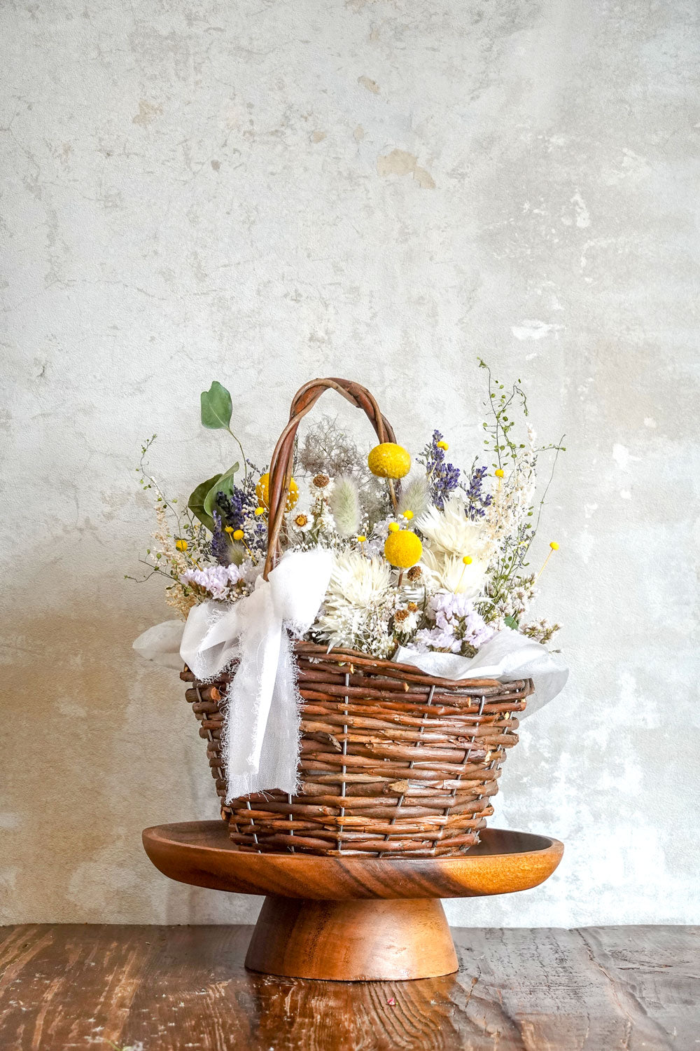 Billy button basket arrangement